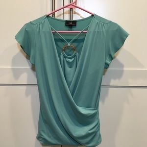 Cute seafoam green top, medium.